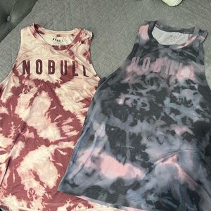 Two Nobull Tie dye high neck tanks. Soft and flowy. Love these! Sz Med